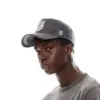 CULT INDIVIDUALITY SHIMUCHAN LOGO MESH BACK TRUCKER HAT IN VINTAGE CHARCOAL